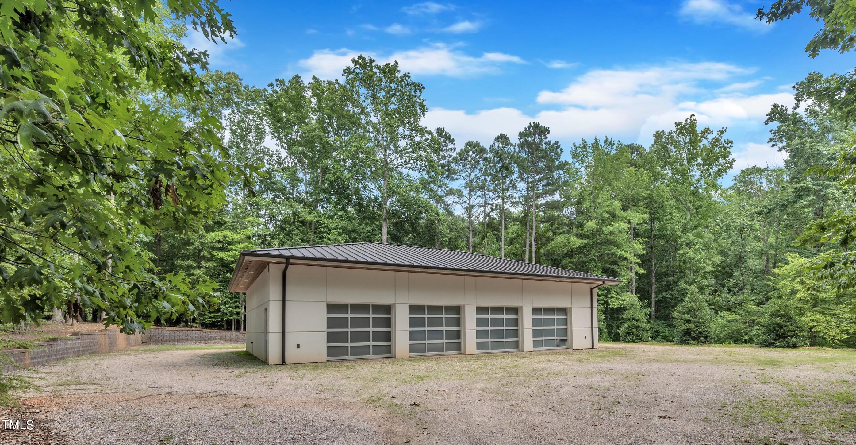 8510 Dunlee Falls Road Raleigh, NC 27613 - Photo 27 of 38 29-8510 Dunlee Falls Rd-garage1