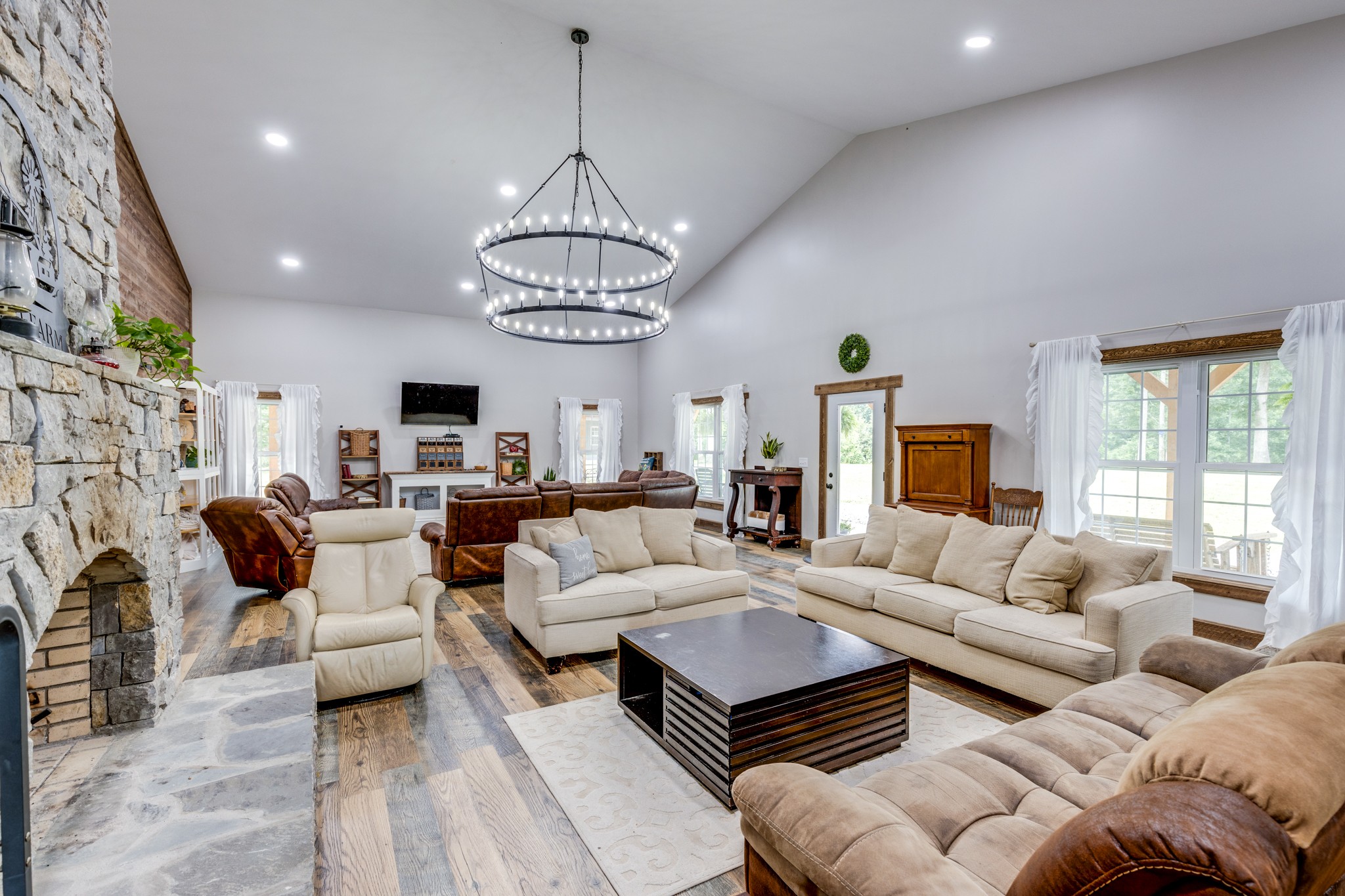 2790 9 Mile Ridge Road Duck River, TN 38454 - Photo 13 of 70 a living room with furniture chandelier and a chandelier