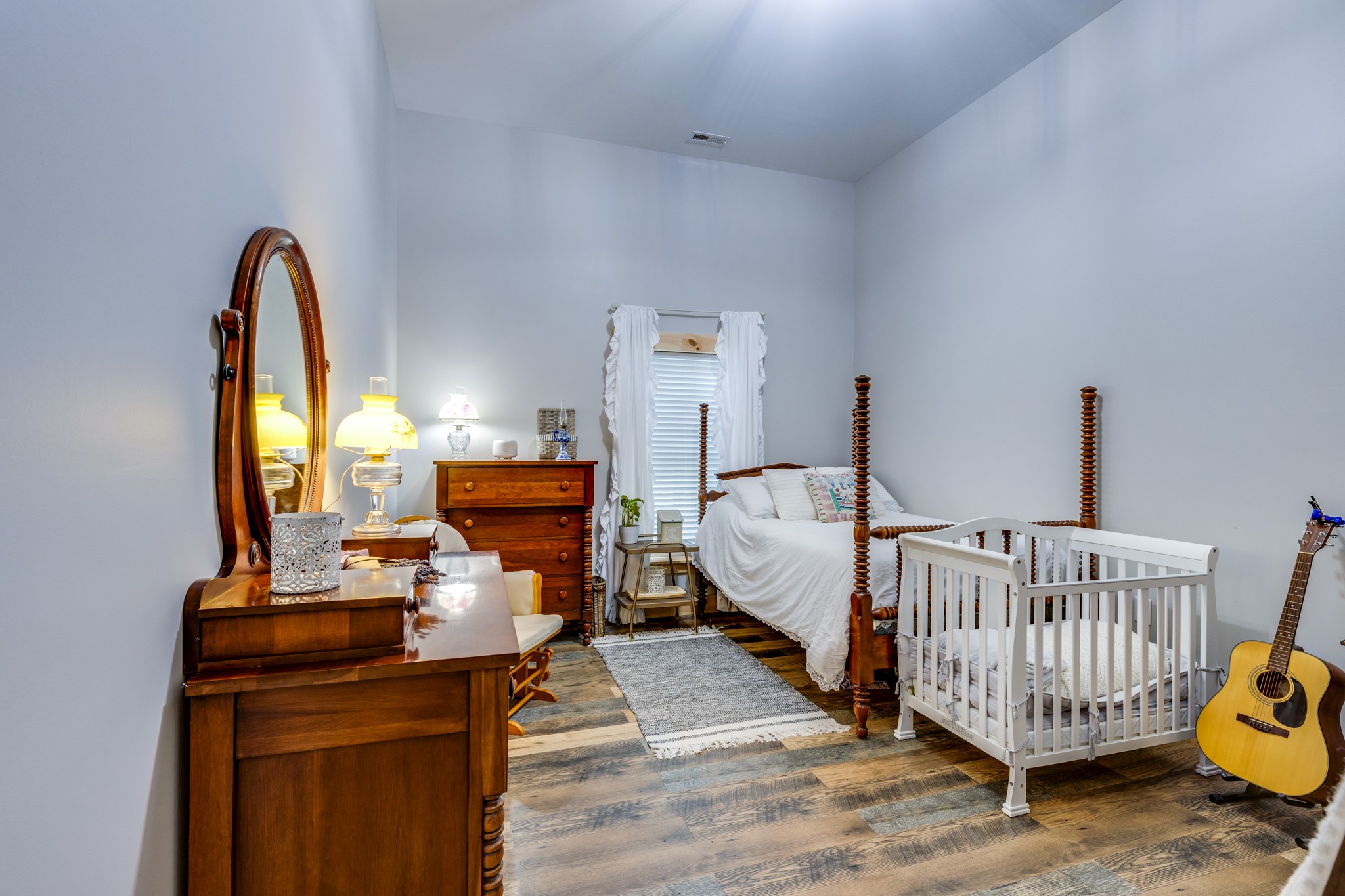 2790 9 Mile Ridge Road Duck River, TN 38454 - Photo 23 of 70 a bed room with furniture and a window