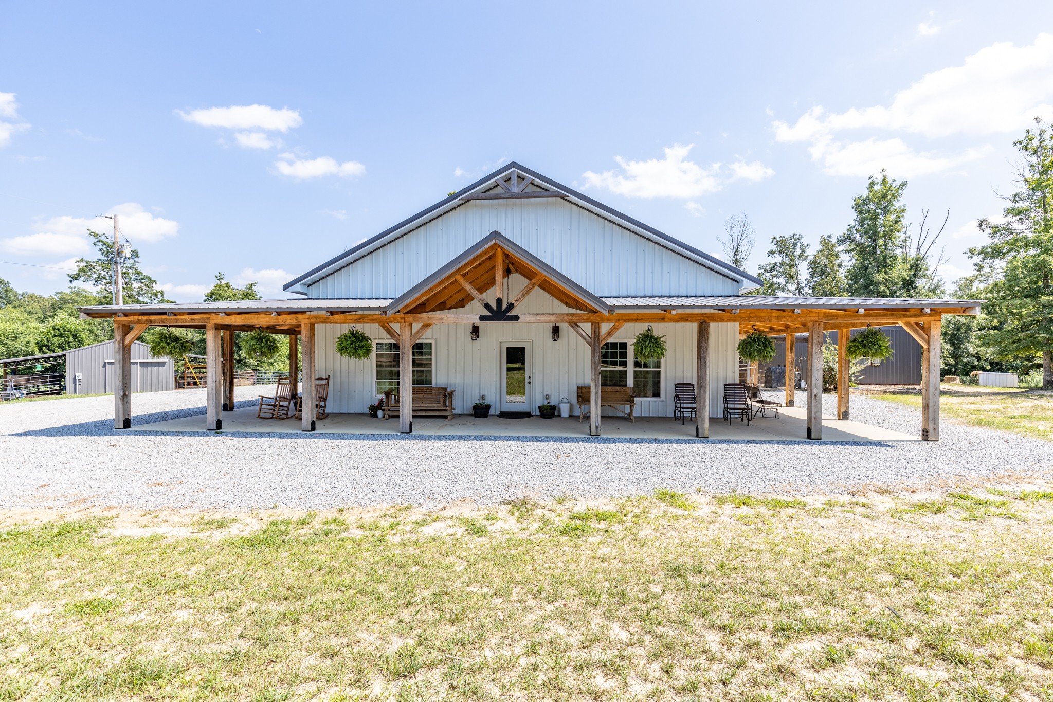 2790 9 Mile Ridge Road Duck River, TN 38454 - Photo 3 of 70 a view of a house with a yard and sitting area