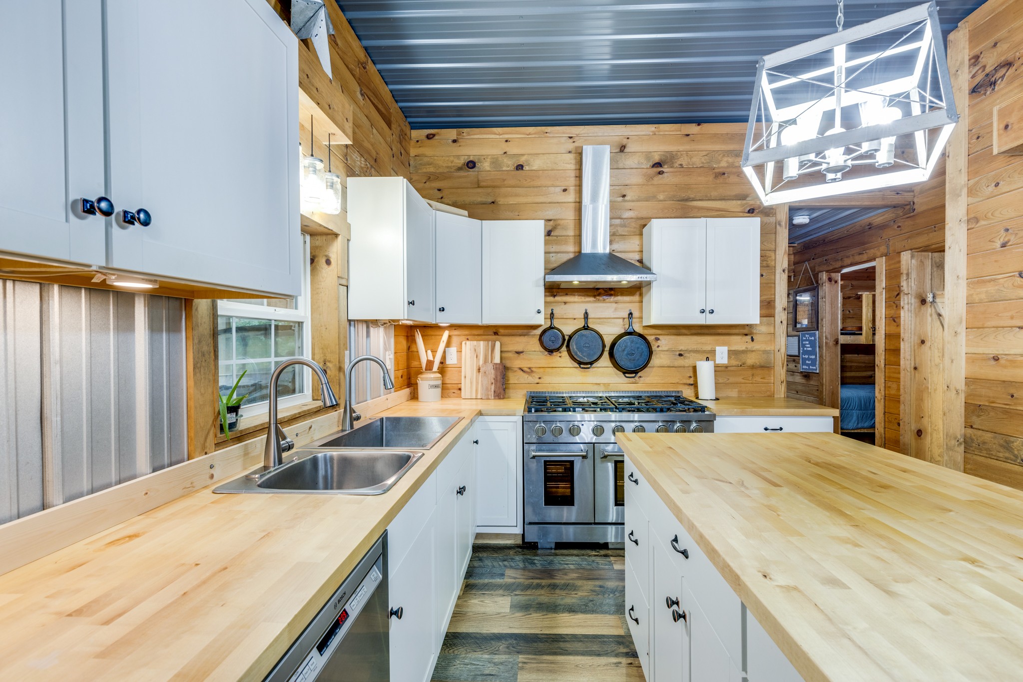 2790 9 Mile Ridge Road Duck River, TN 38454 - Photo 32 of 70 a kitchen that has a lot of cabinets in it