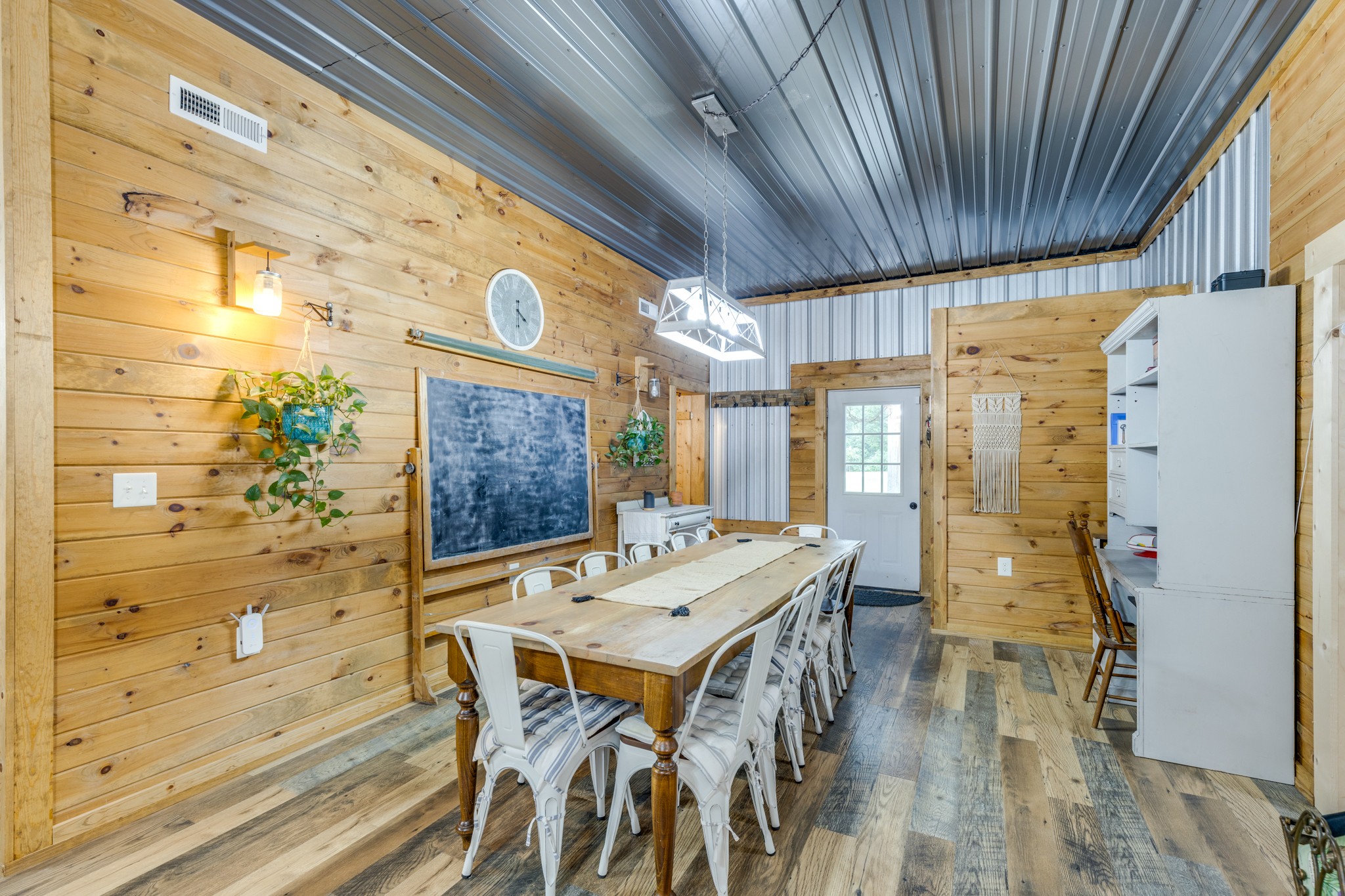 2790 9 Mile Ridge Road Duck River, TN 38454 - Photo 36 of 70 a view of a dining room with furniture window and wooden floor