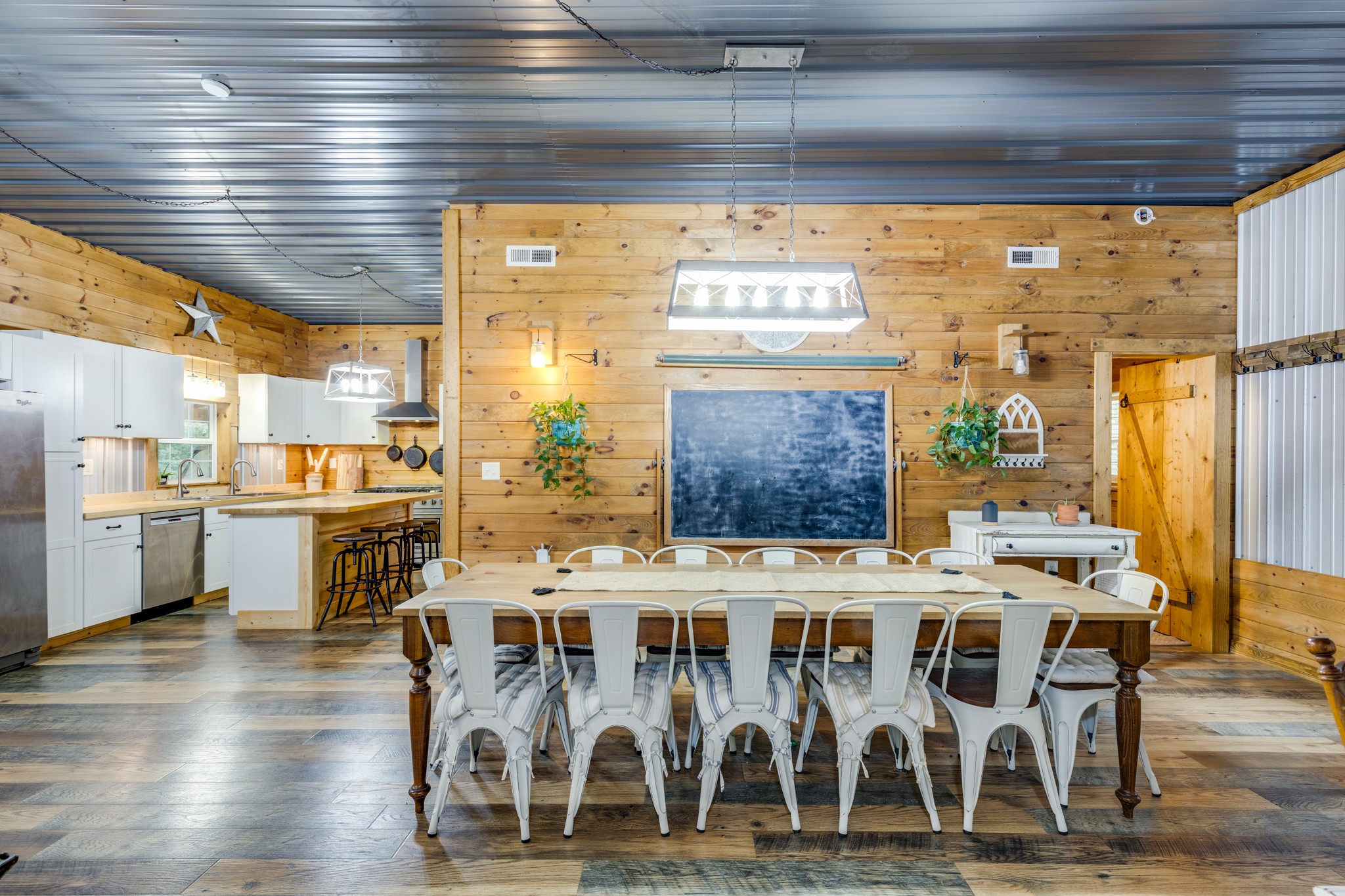 2790 9 Mile Ridge Road Duck River, TN 38454 - Photo 37 of 70 a view of a dining room with furniture window and wooden floor