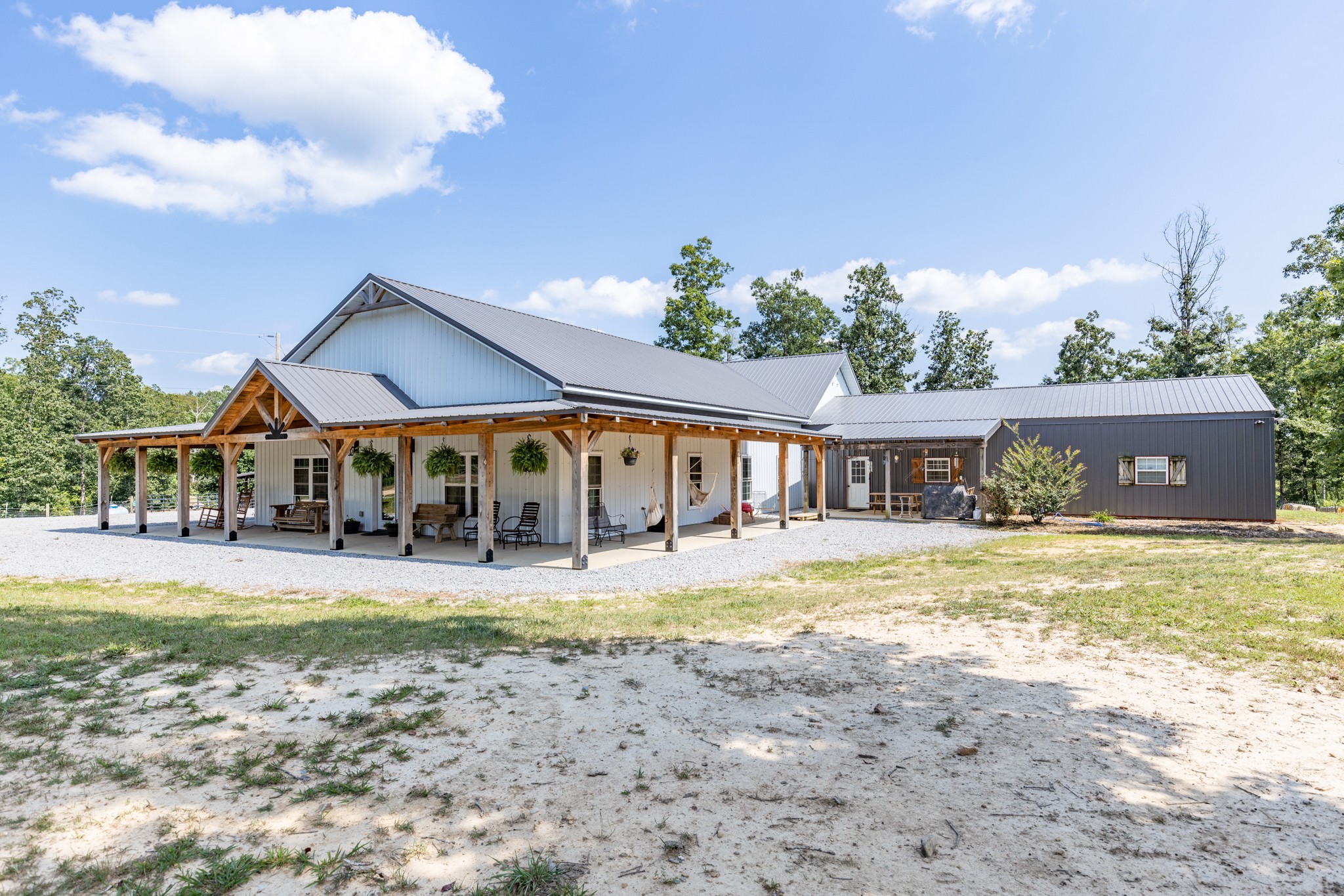 2790 9 Mile Ridge Road Duck River, TN 38454 - Photo 4 of 70 a view of a house with a yard and a tree