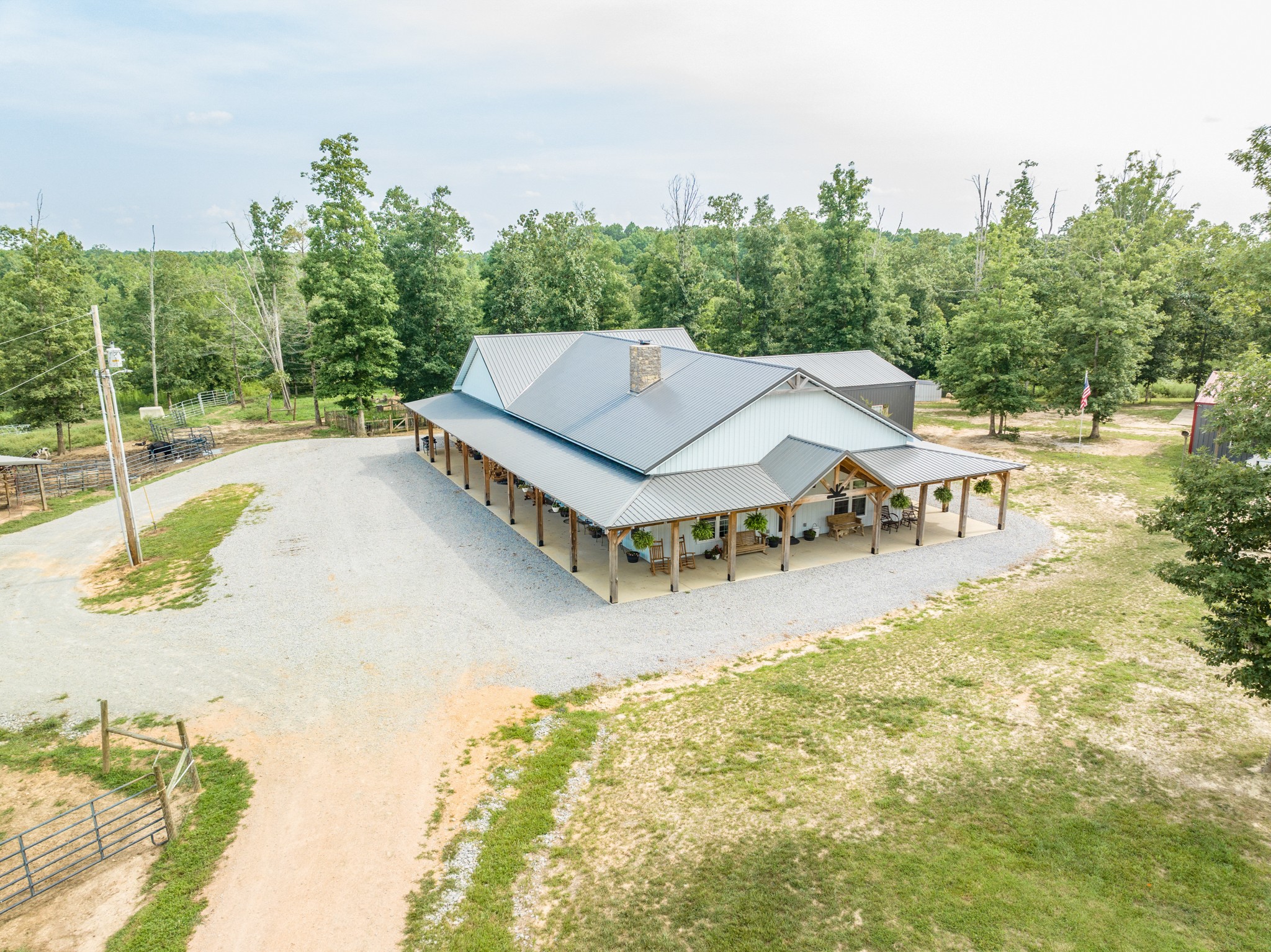 2790 9 Mile Ridge Road Duck River, TN 38454 - Photo 46 of 70 a view of a swimming pool with a patio and garden