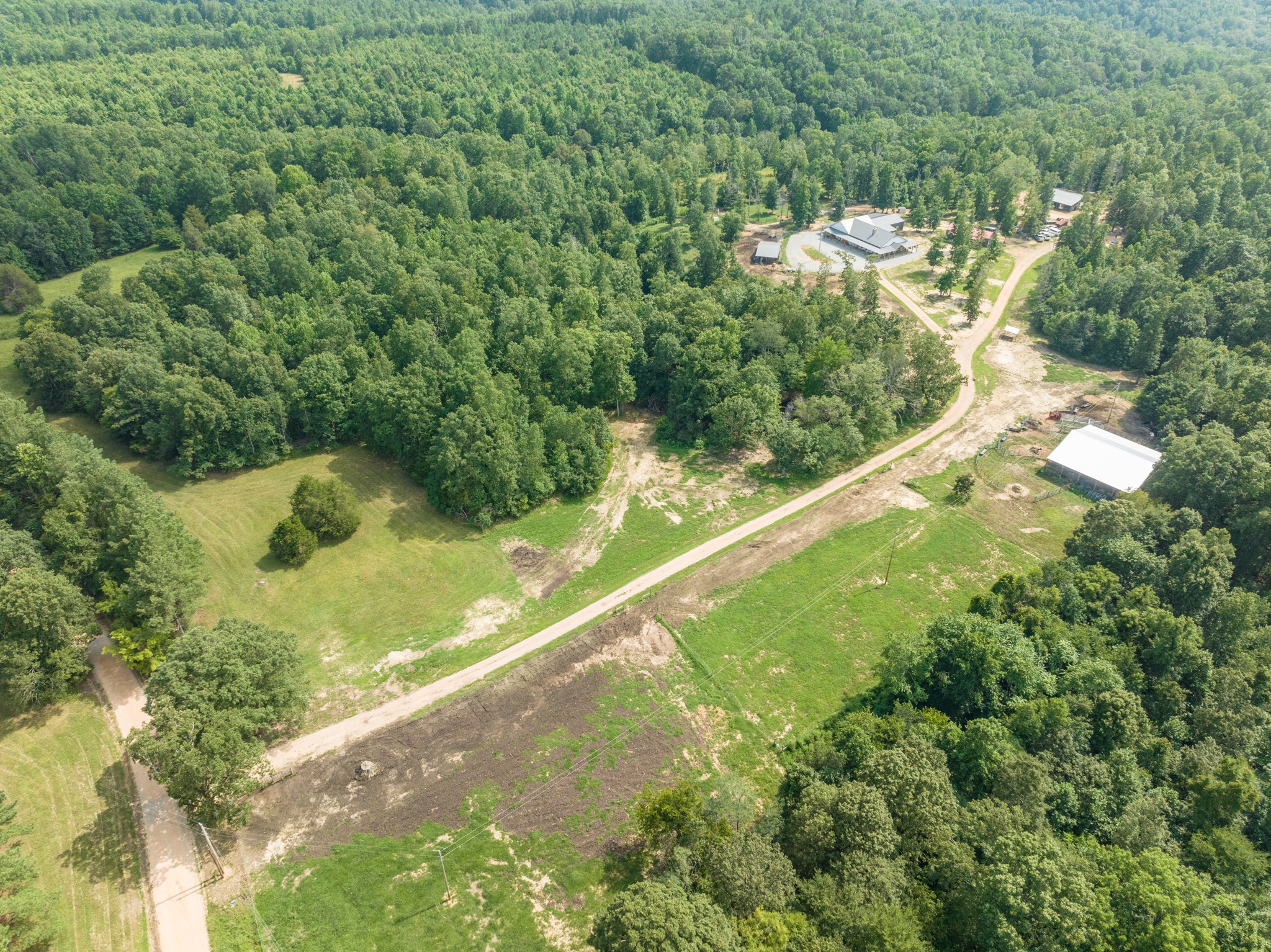 2790 9 Mile Ridge Road Duck River, TN 38454 - Photo 58 of 70 a view of a lake with a city