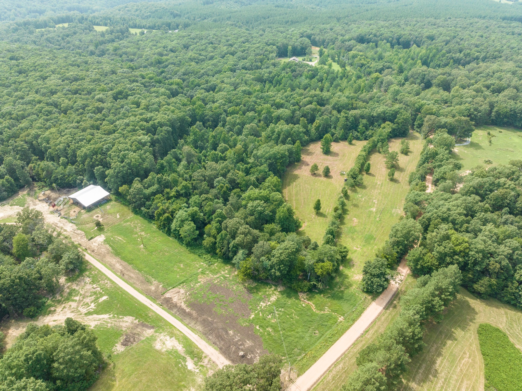 2790 9 Mile Ridge Road Duck River, TN 38454 - Photo 61 of 70 a view of a lake with a yard