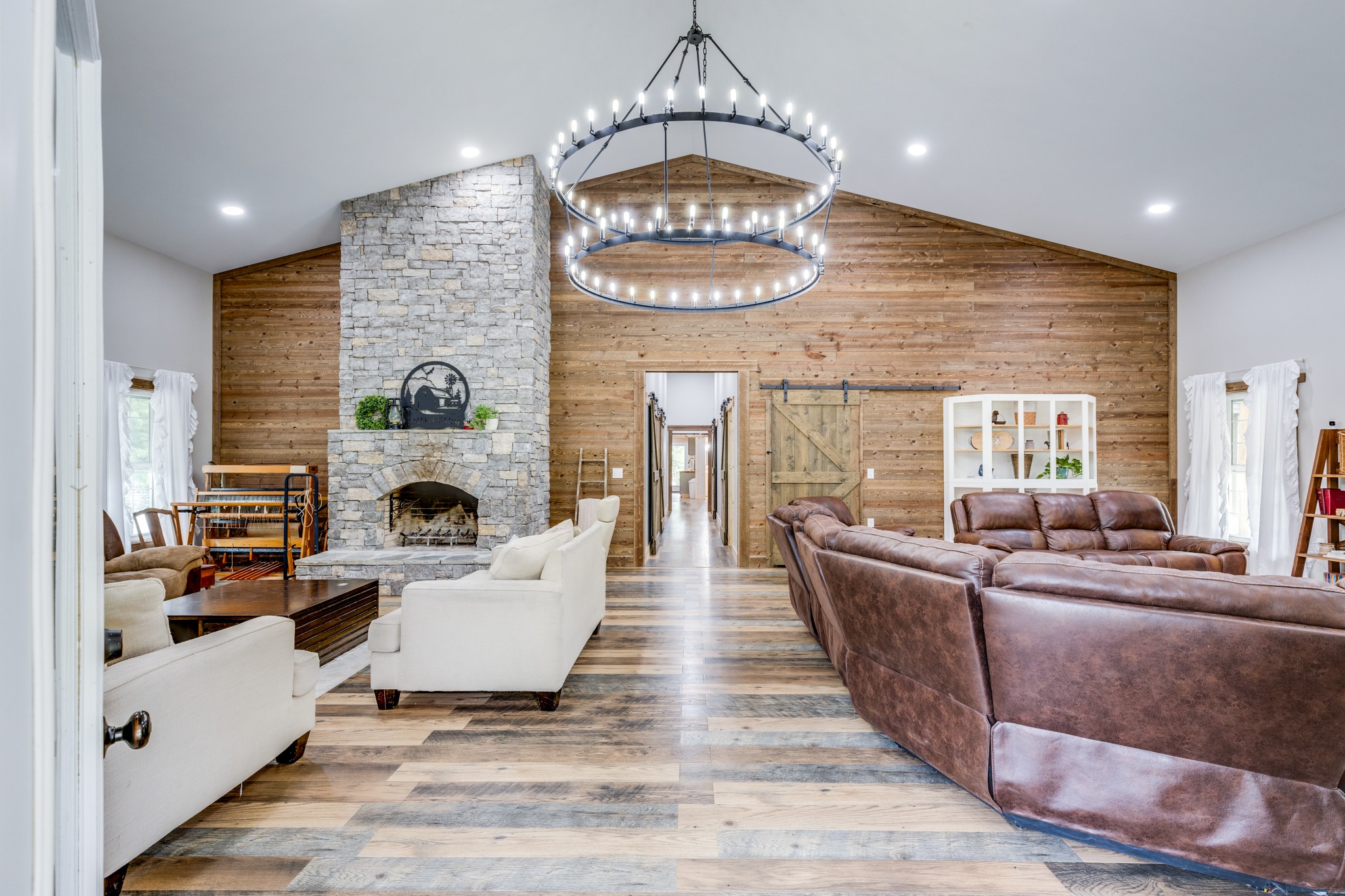 2790 9 Mile Ridge Road Duck River, TN 38454 - Photo 9 of 70 a living room with furniture and a fireplace