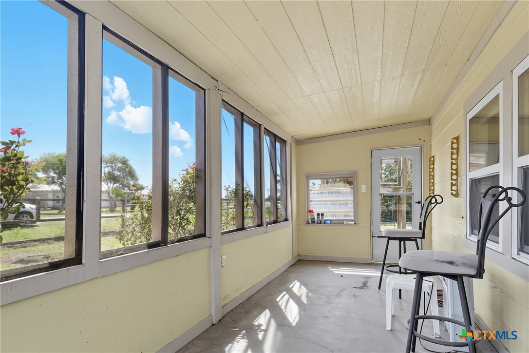 488 Alamo Beach Avenue Port Lavaca, TX 77979 - Photo 16 of 36 a view of an entryway with wooden floor and windows