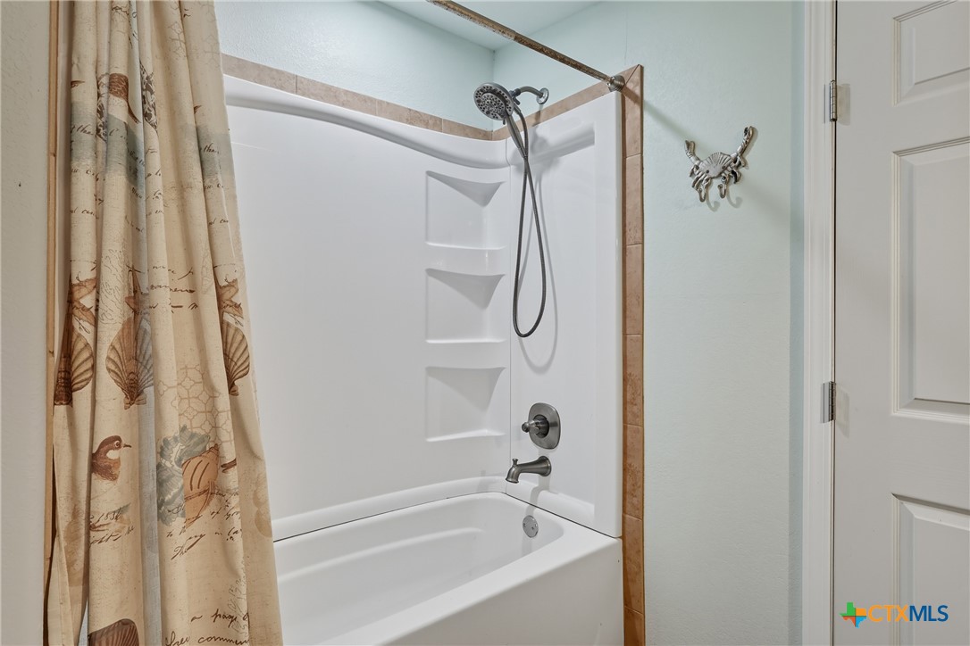 488 Alamo Beach Avenue Port Lavaca, TX 77979 - Photo 22 of 36 a bathroom with a shower and a shower