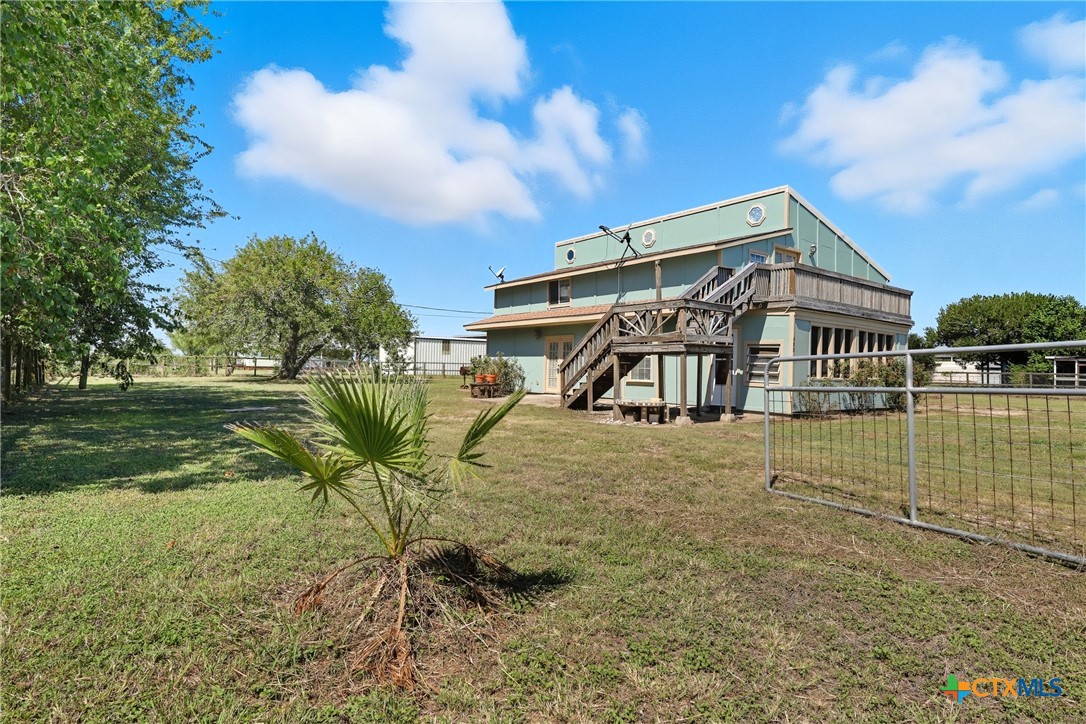 488 Alamo Beach Avenue Port Lavaca, TX 77979 - Photo 31 of 36 a house with river in the background