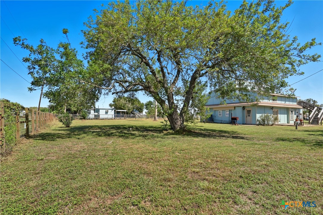 488 Alamo Beach Avenue Port Lavaca, TX 77979 - Photo 32 of 36 a view of a house with a yard