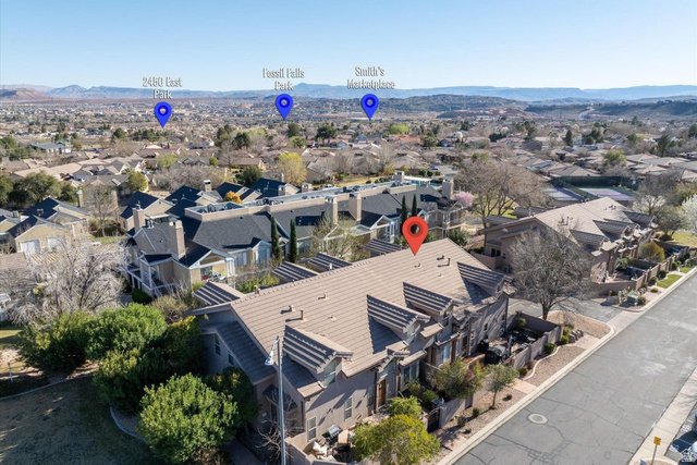 345 North 2450th Street East, Unit 152 St. George, UT 84790 - Photo 34 of 40 Aerial perspective of suburban area featuring mountains