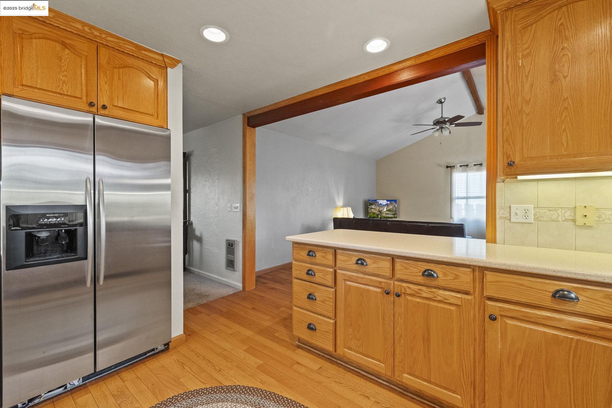 21645 La Vereda Road Sonora, CA 95370 - Photo 12 of 32 a kitchen with cabinets and stainless steel appliances