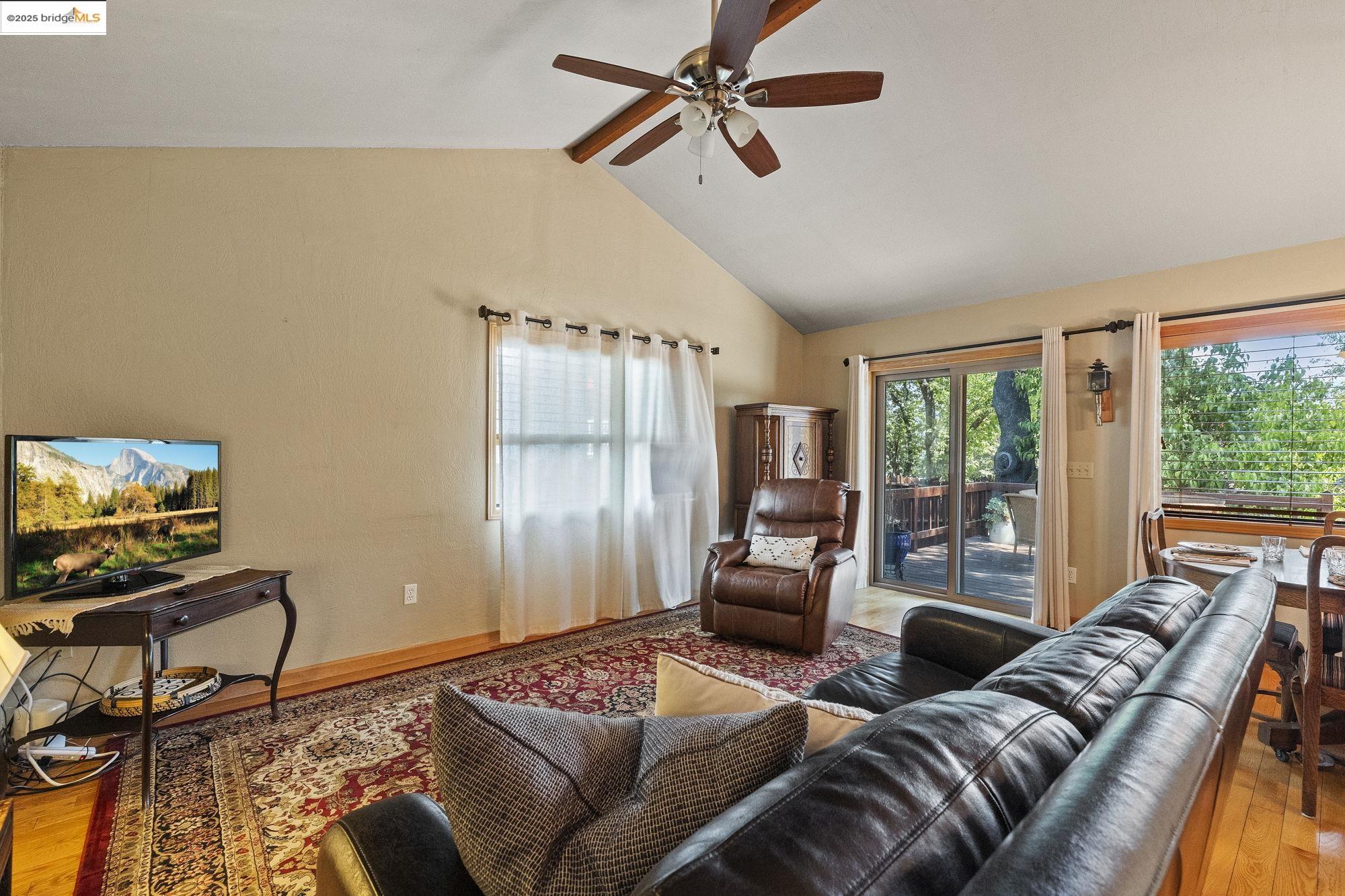 21645 La Vereda Road Sonora, CA 95370 - Photo 15 of 32 a living room with furniture and a window