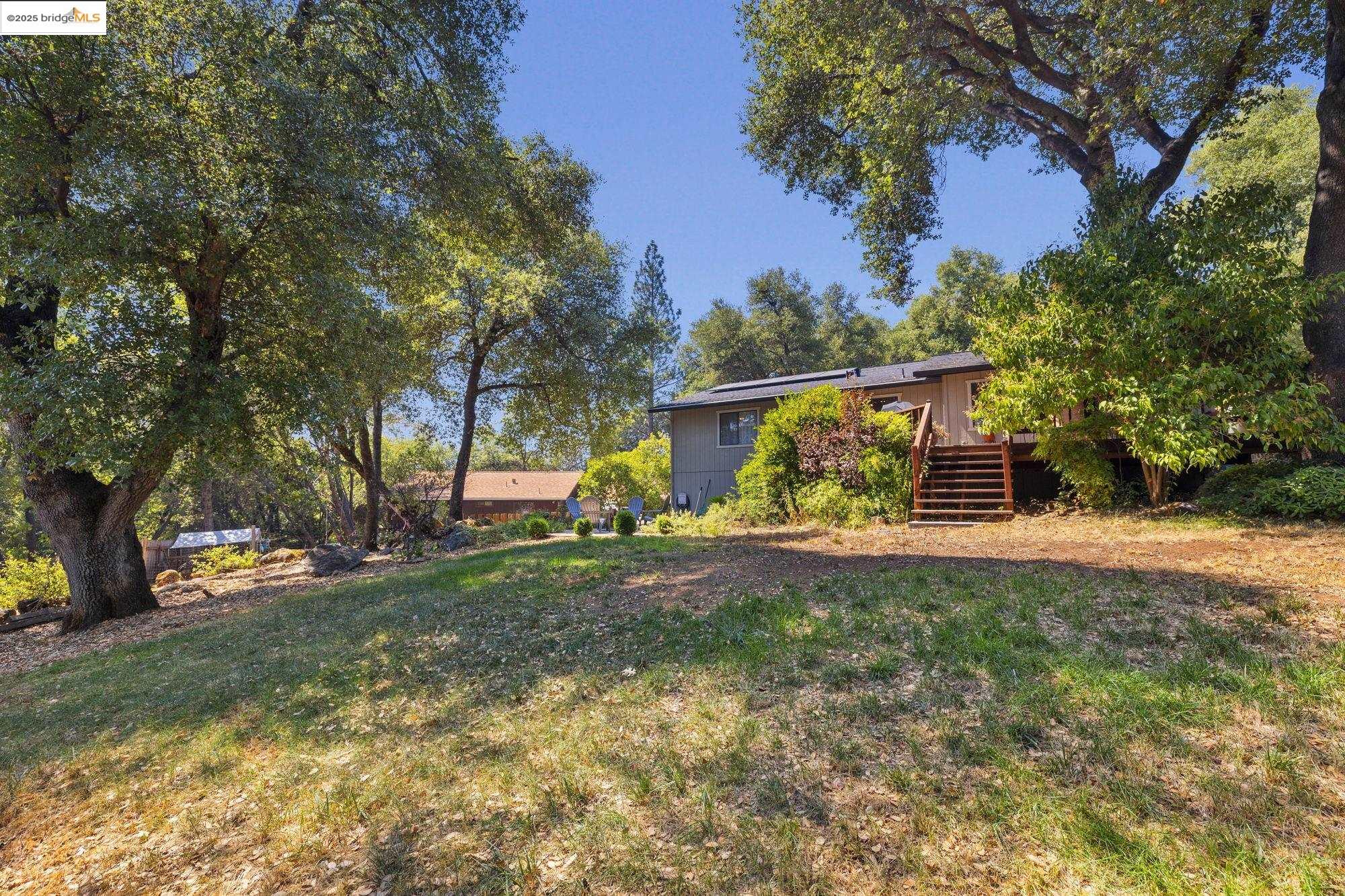 21645 La Vereda Road Sonora, CA 95370 - Photo 29 of 32 a view of a yard in front of the house
