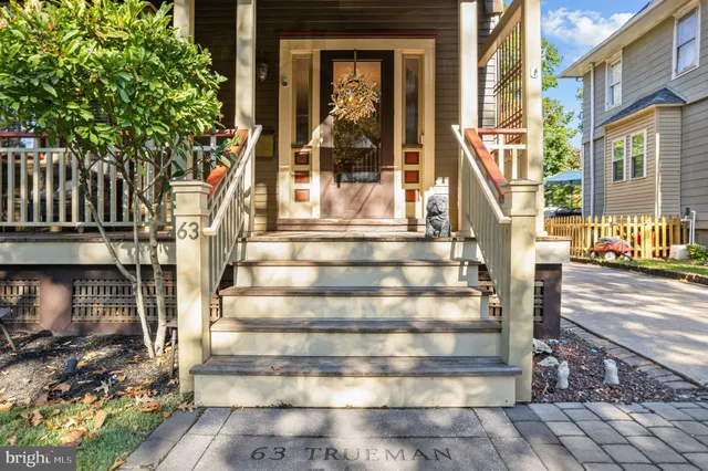 a view of a building with a window and stairs