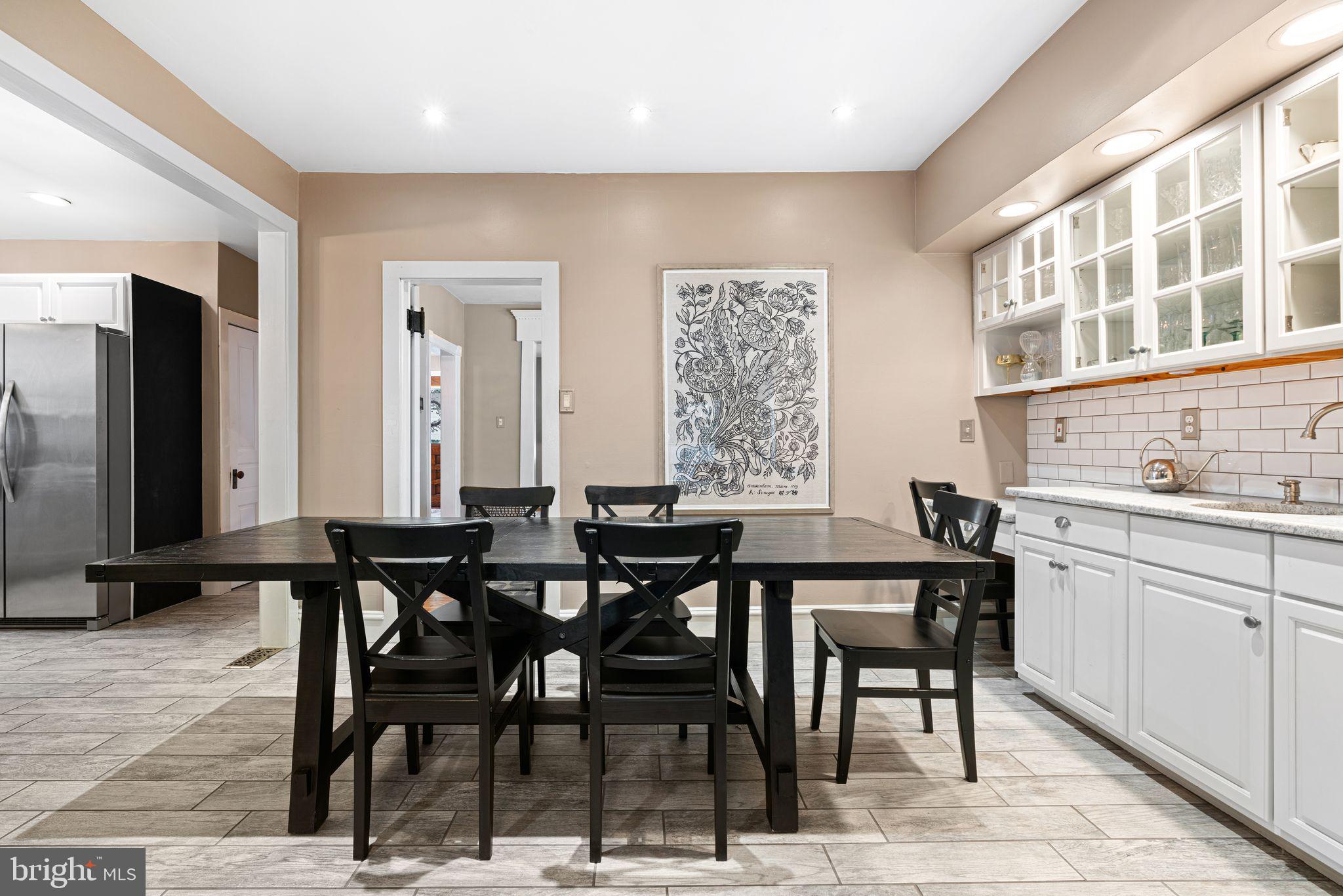 63 Trueman Avenue Haddonfield, NJ 08033 - Photo 12 of 46 a view of a a dining room with chairs
