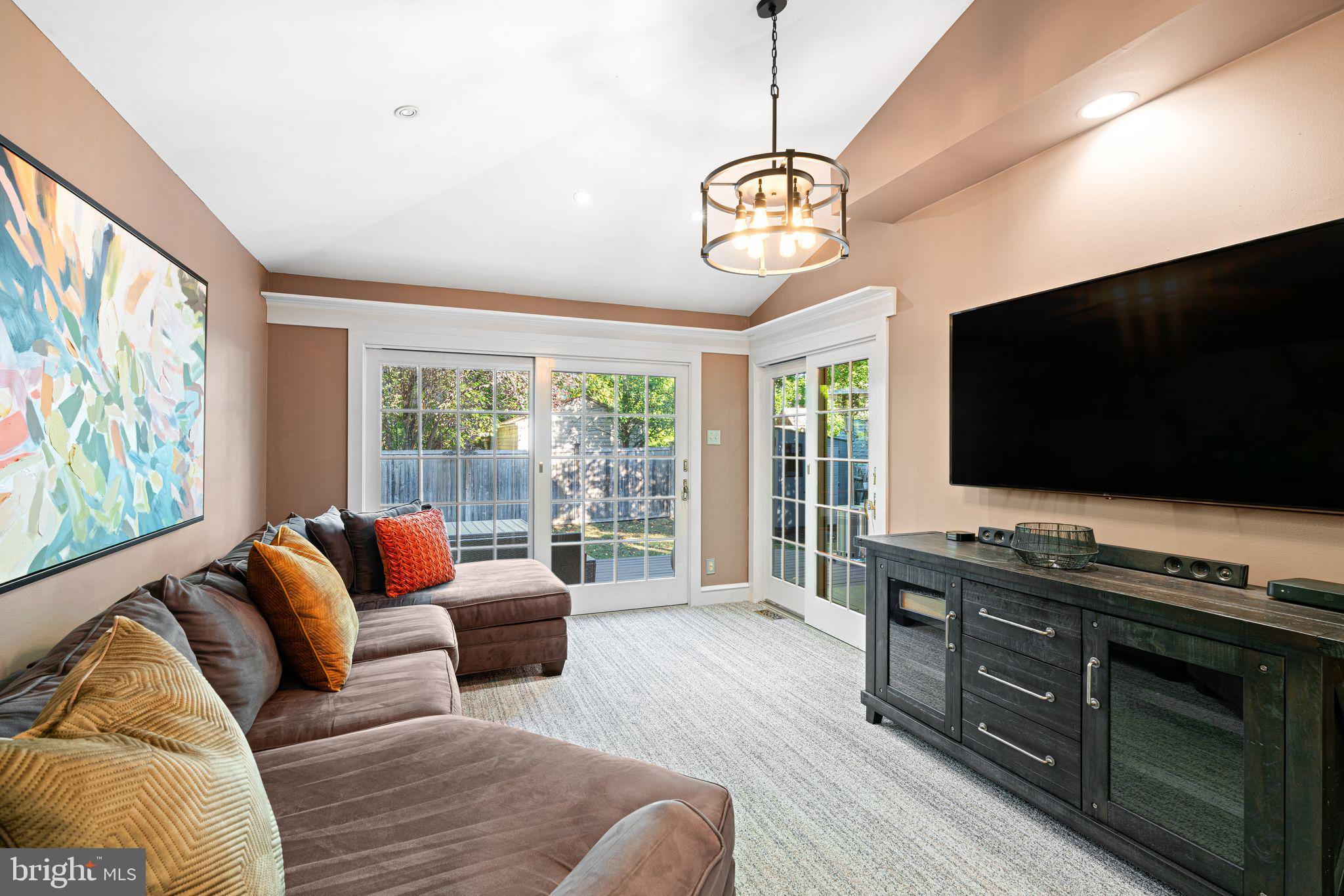 63 Trueman Avenue Haddonfield, NJ 08033 - Photo 14 of 46 a living room with furniture and a flat screen tv
