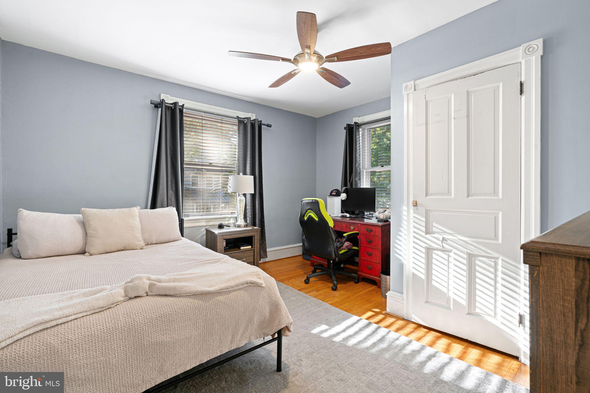 63 Trueman Avenue Haddonfield, NJ 08033 - Photo 22 of 46 a bedroom with a bed and a chandelier