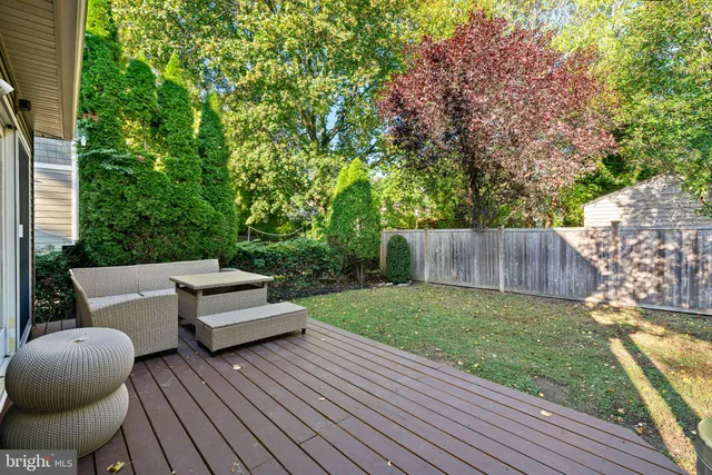 a view of backyard with seating space