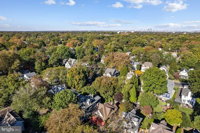 a front view of a house with yard porch and furniture