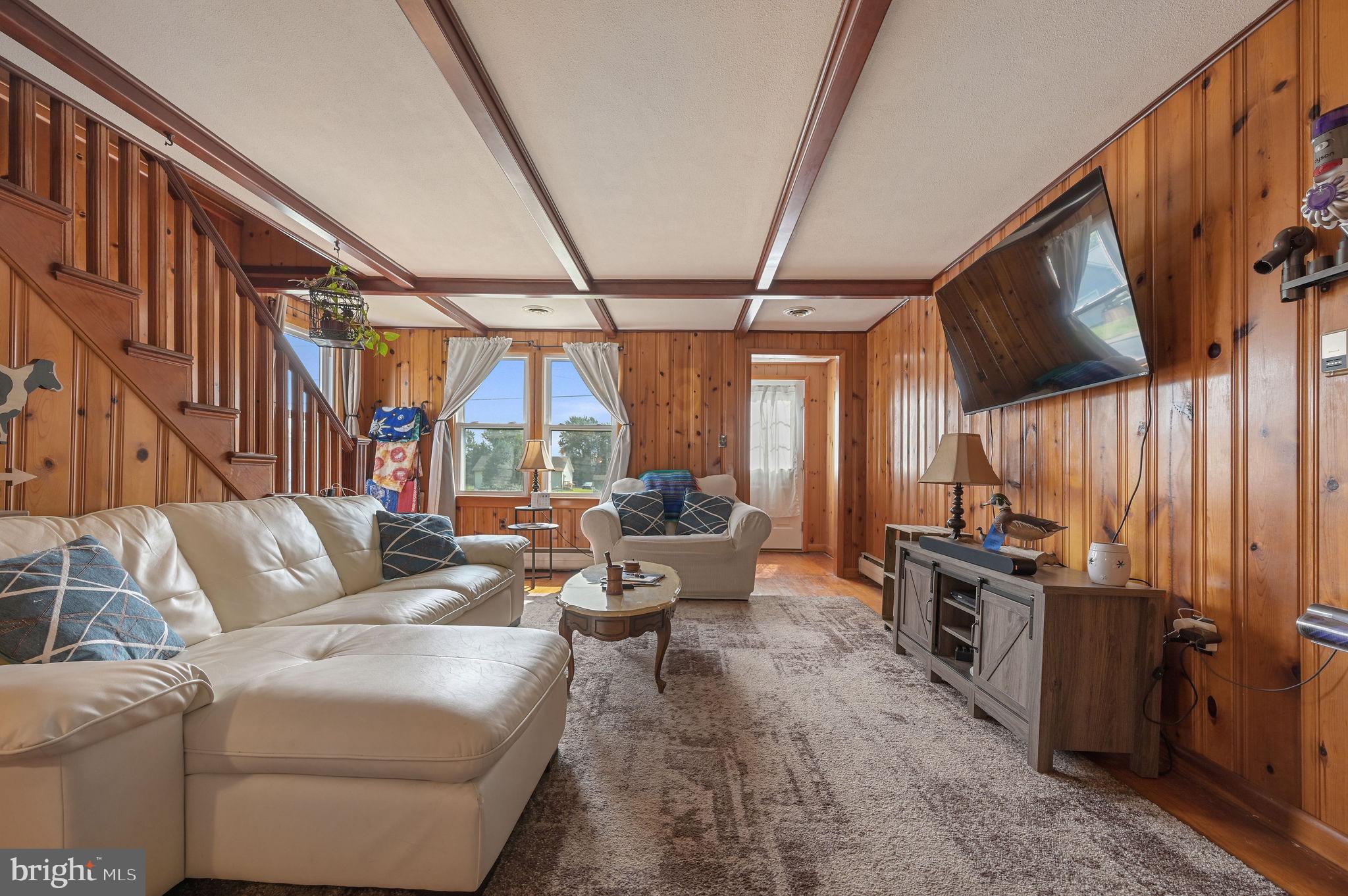 11 Simpson Street Harrington, DE 19952 - Photo 11 of 29 a living room with furniture and a flat screen tv