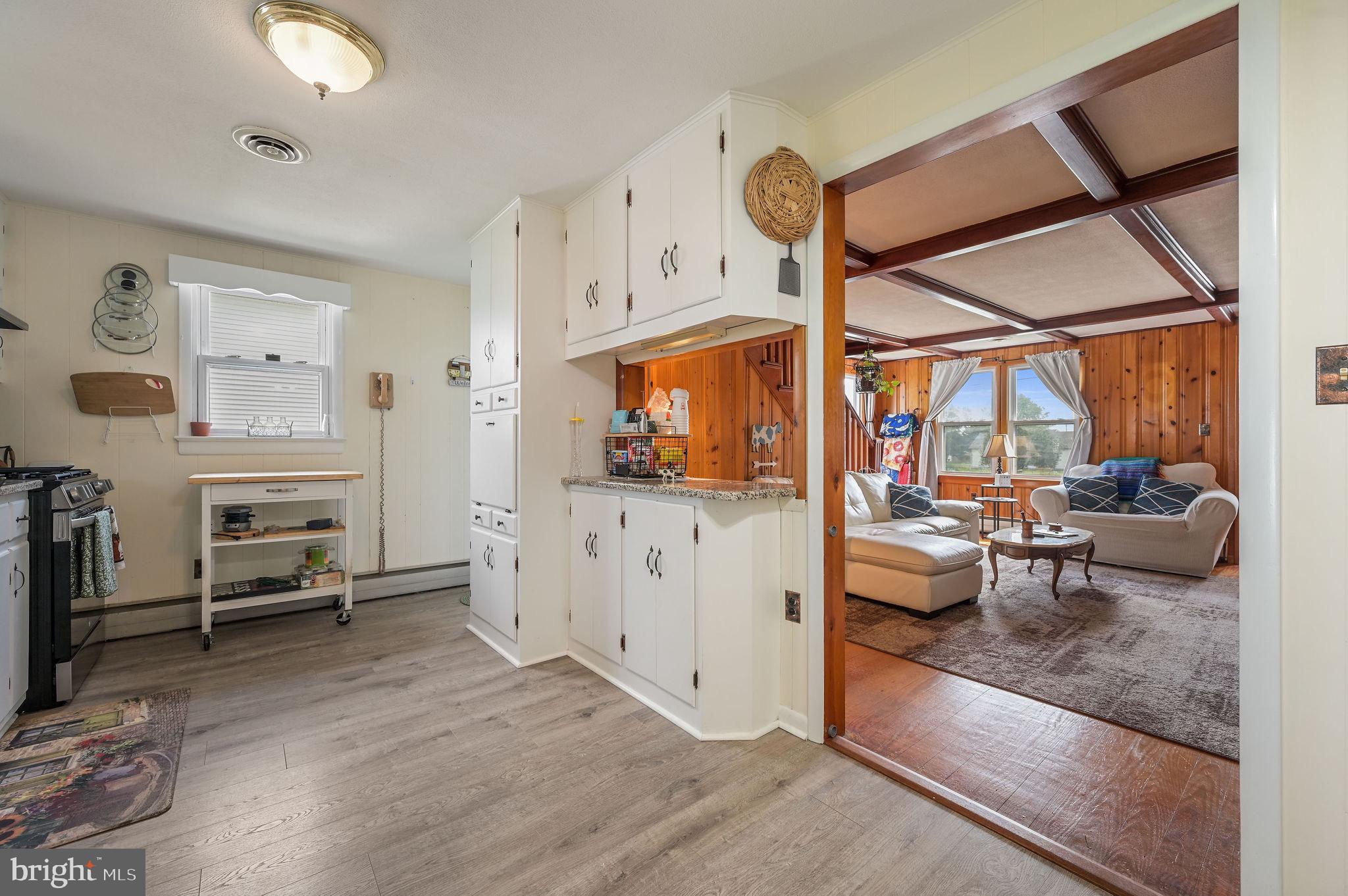 11 Simpson Street Harrington, DE 19952 - Photo 18 of 29 a living room with furniture and a flat screen tv