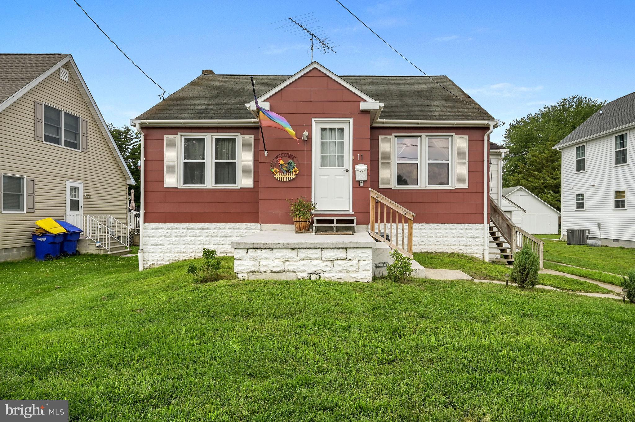 11 Simpson Street Harrington, DE 19952 - Photo 2 of 29 a front view of a house with a yard