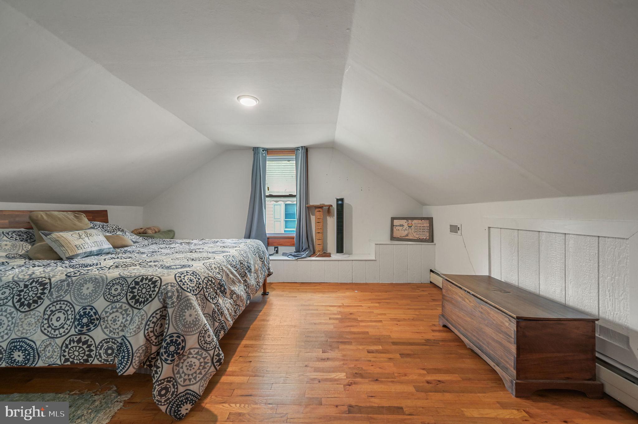 11 Simpson Street Harrington, DE 19952 - Photo 26 of 29 a spacious bedroom with a bed and a window
