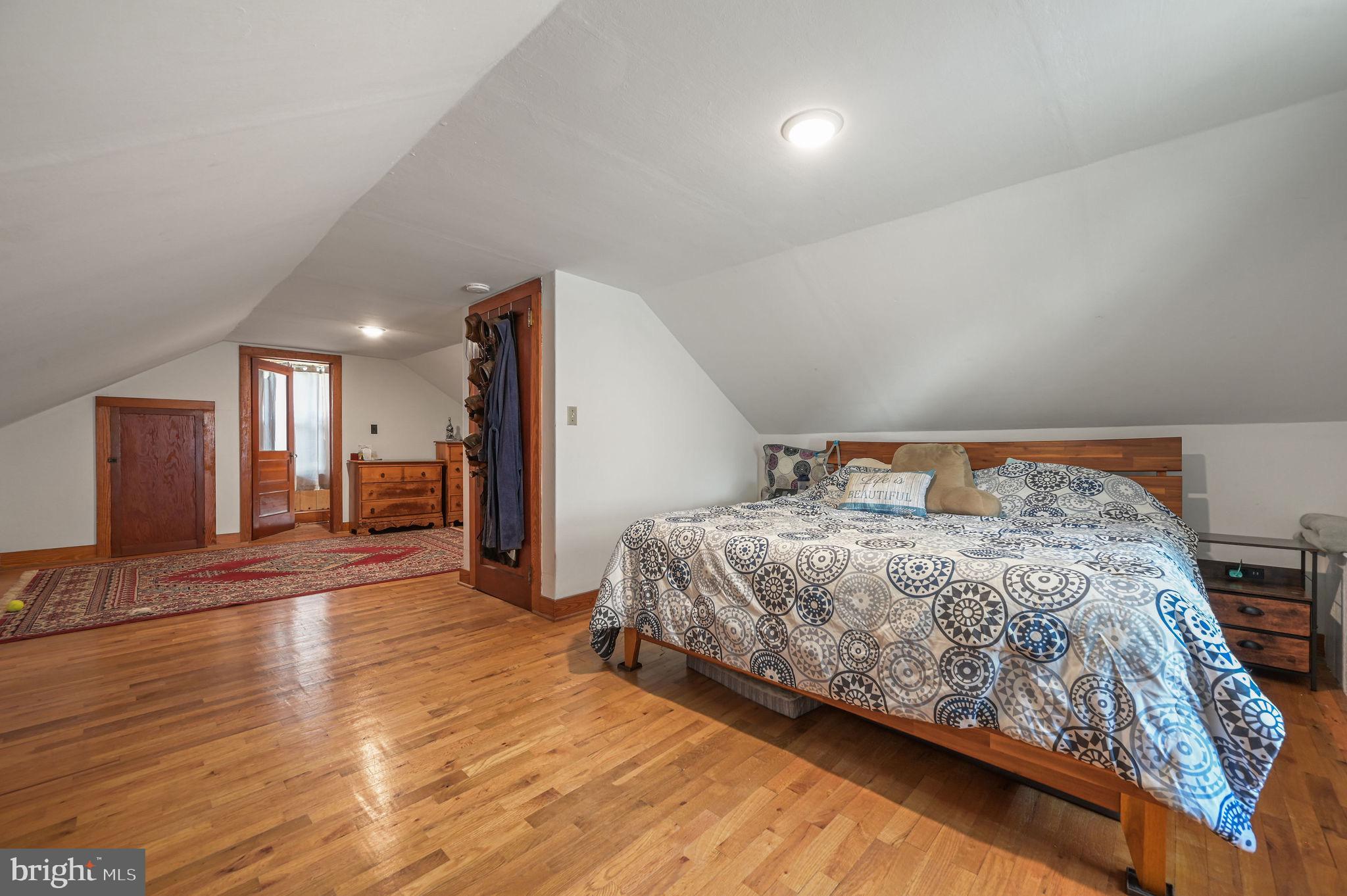 11 Simpson Street Harrington, DE 19952 - Photo 27 of 29 a bedroom with a bed and a view of kitchen