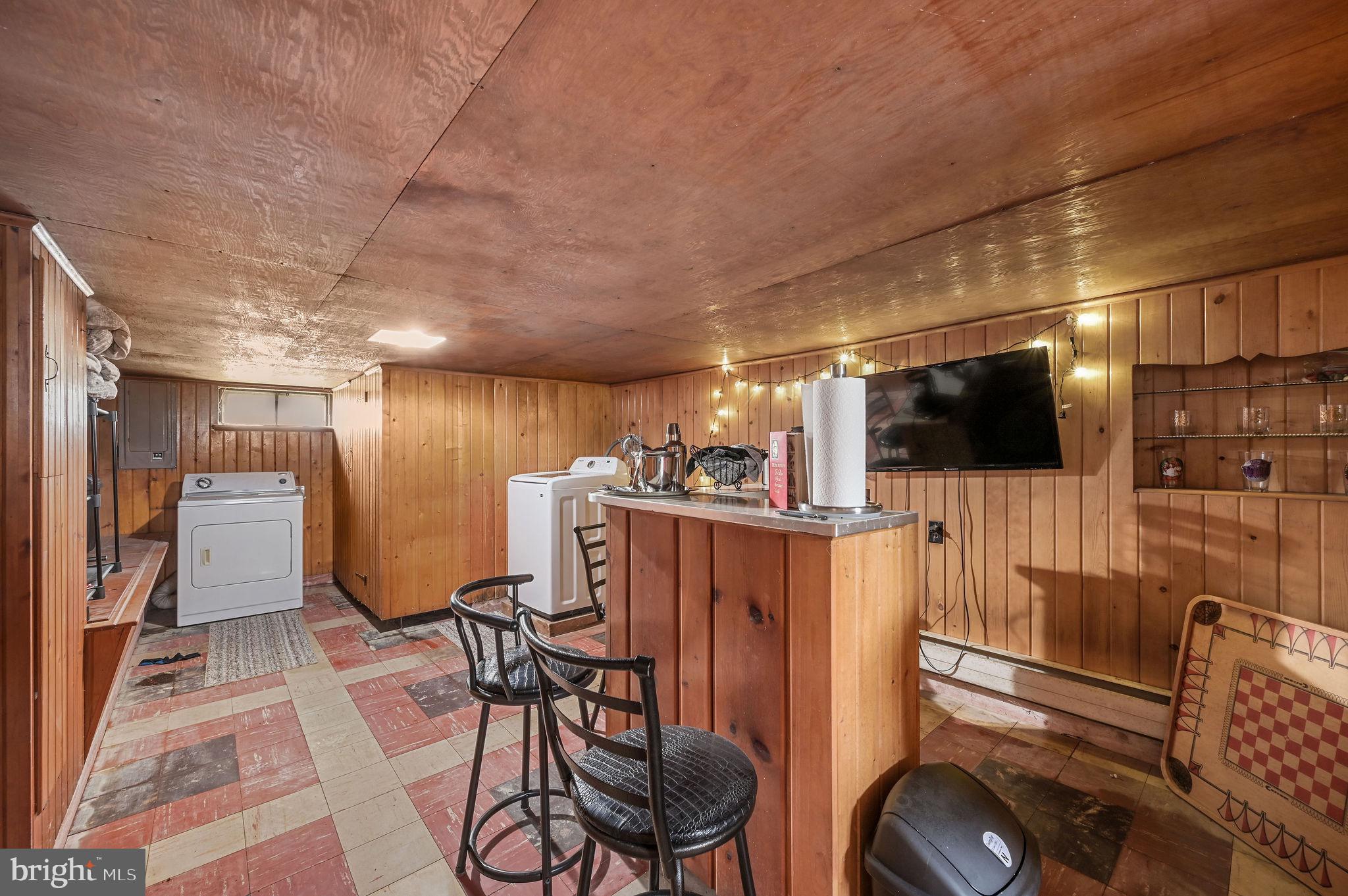 11 Simpson Street Harrington, DE 19952 - Photo 28 of 29 a view of a livingroom with furniture and a flat screen tv