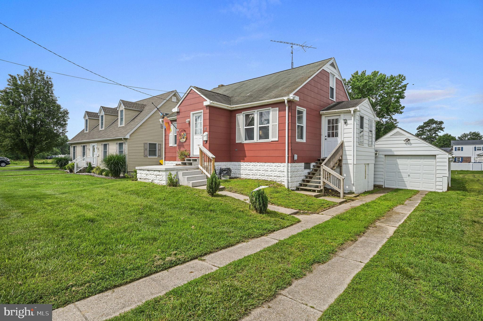 11 Simpson Street Harrington, DE 19952 - Photo 3 of 29 a front view of house with yard and green space