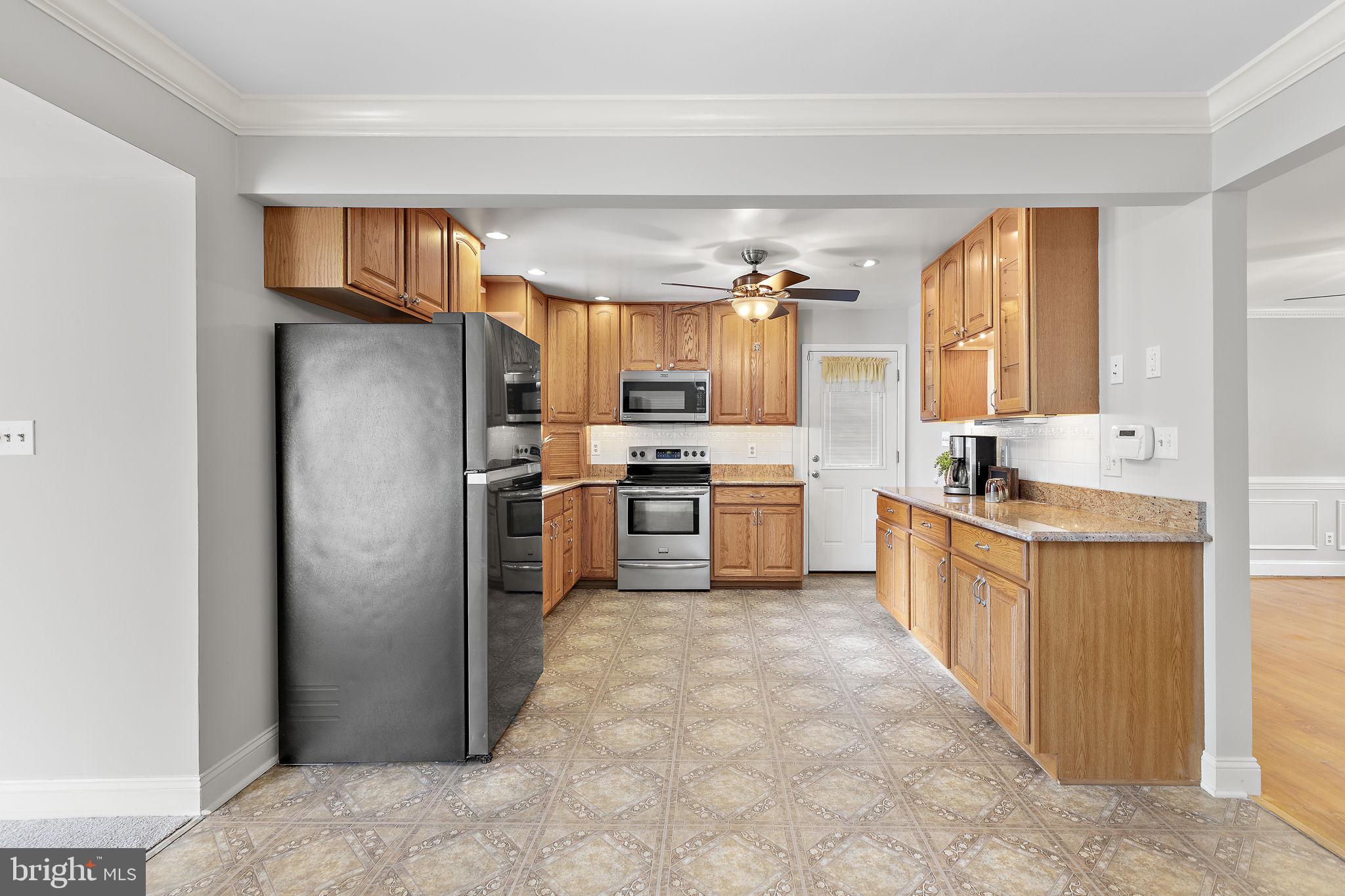 1404 Ryan Road Fallston, MD 21047 - Photo 10 of 50 Kitchen w/ceiling fan & laminate flooring