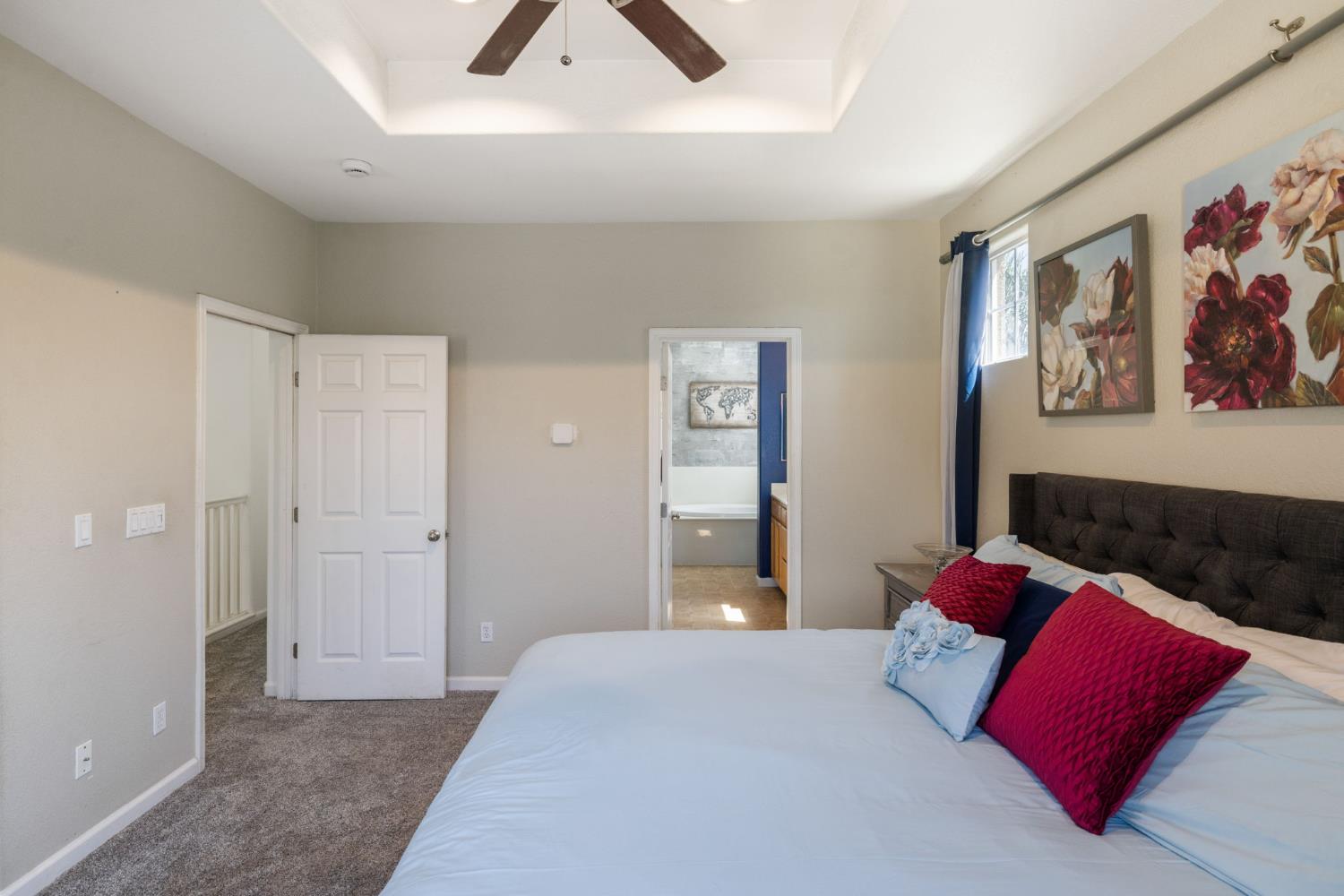 562 Ranger Street Oakdale, CA 95361 - Photo 32 of 64 Master bedroom with entrance to master bathroom