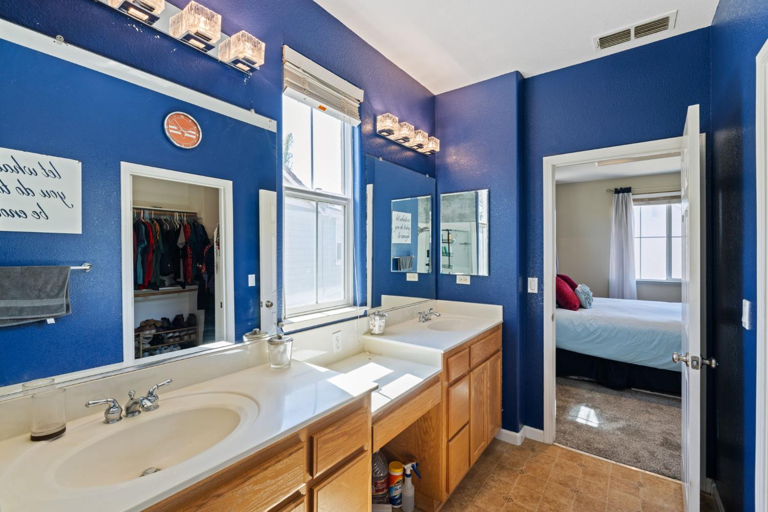 562 Ranger Street Oakdale, CA 95361 - Photo 37 of 64 Master bathroom with double sink vanity