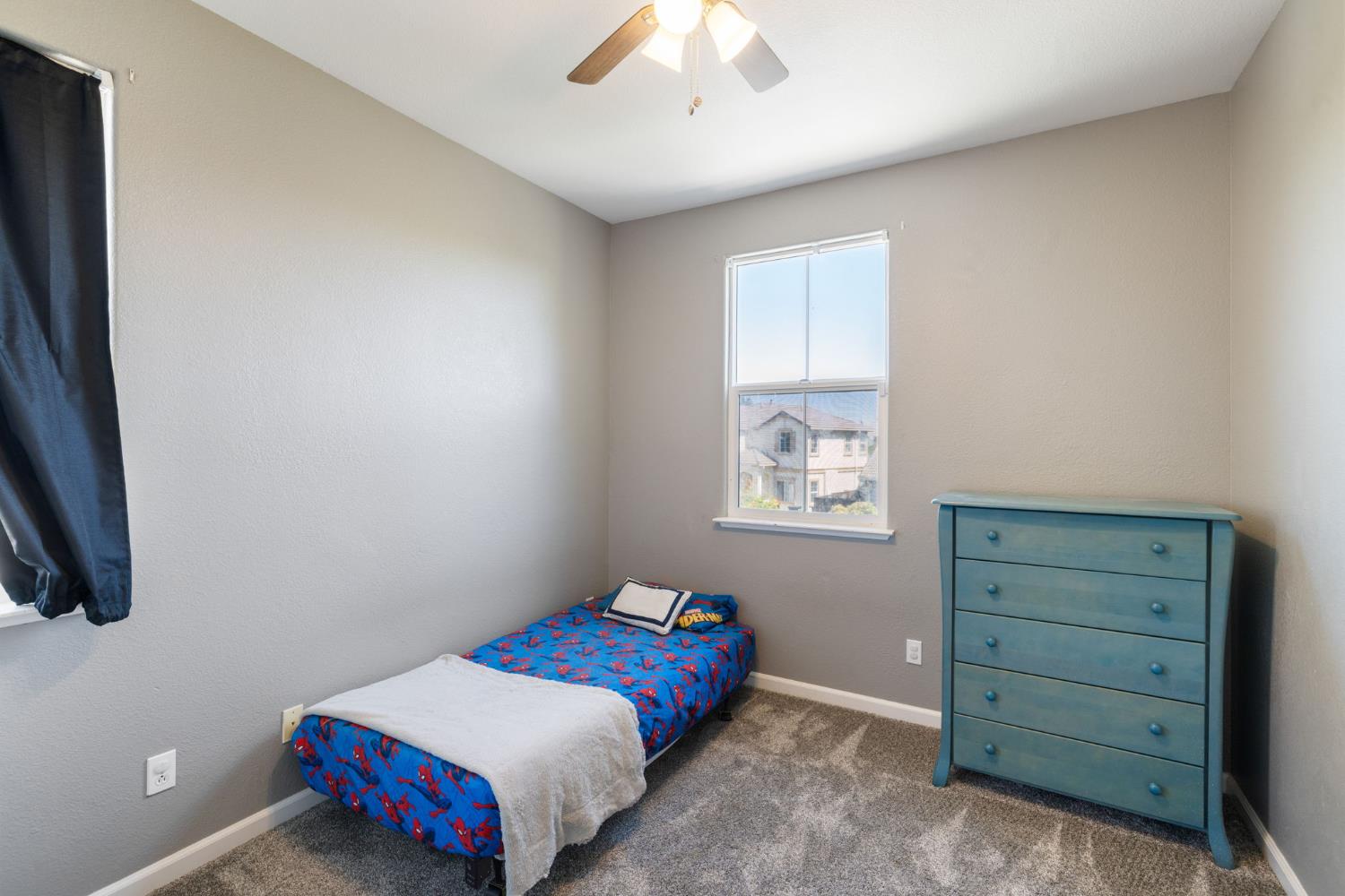 562 Ranger Street Oakdale, CA 95361 - Photo 44 of 64 Upstairs bedroom with ceiling fan