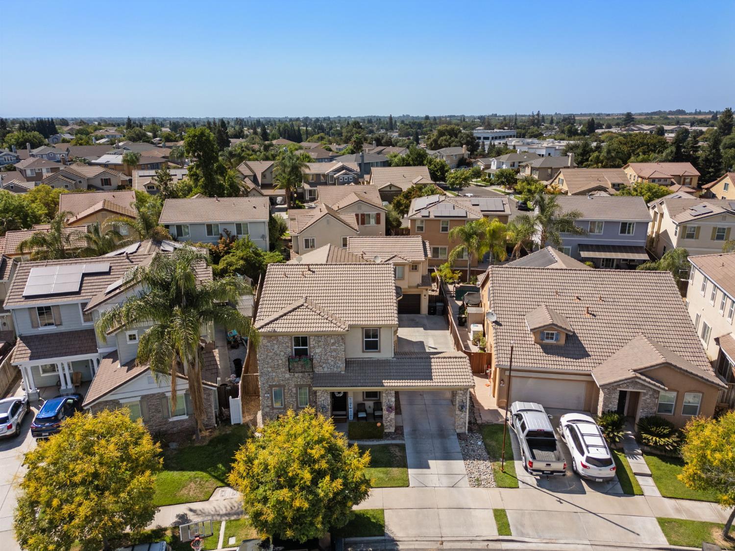 562 Ranger Street Oakdale, CA 95361 - Photo 58 of 64 aerial perspective of suburban area