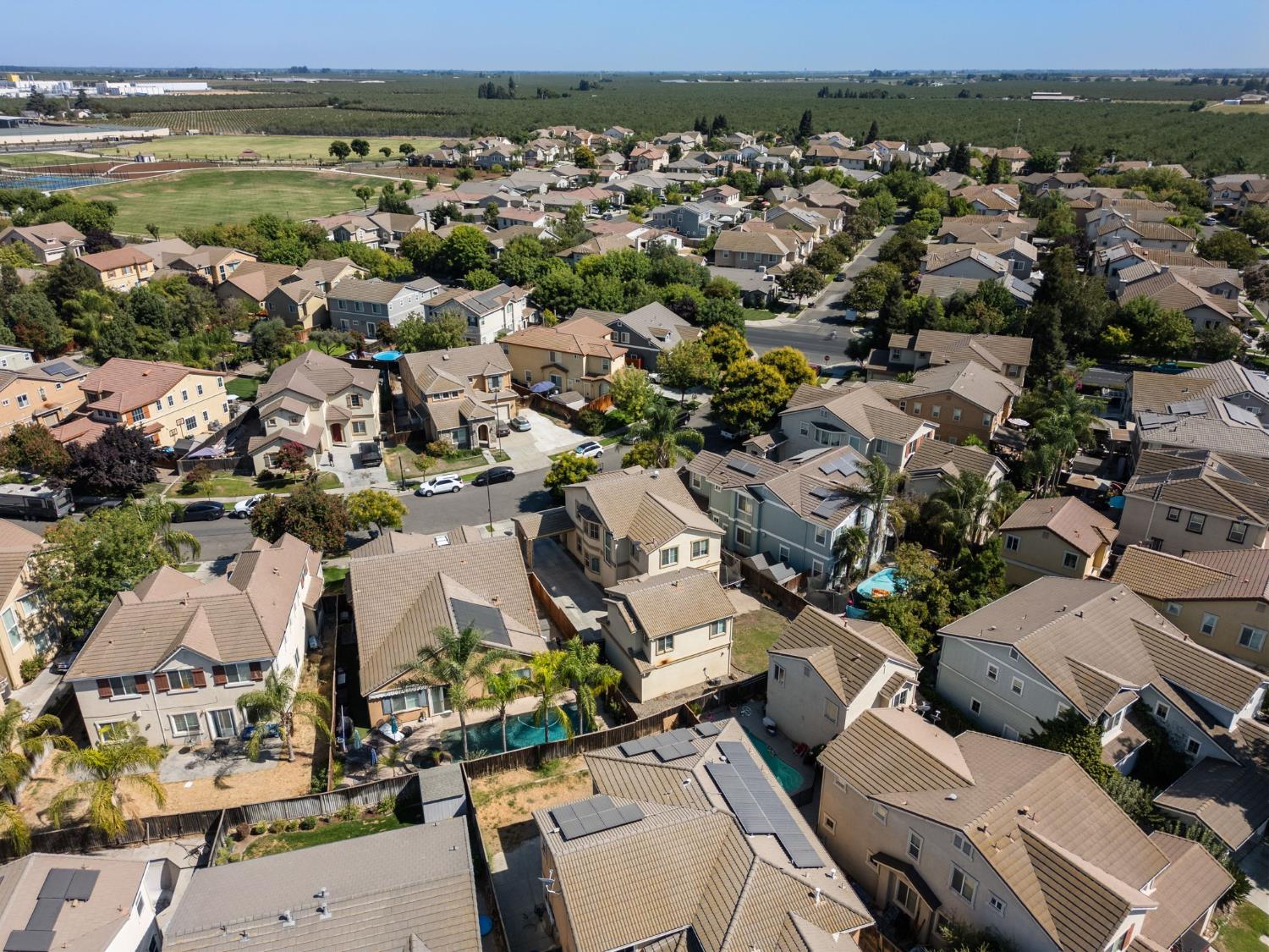 562 Ranger Street Oakdale, CA 95361 - Photo 64 of 64 aerial overview of property's location with nearby suburban area