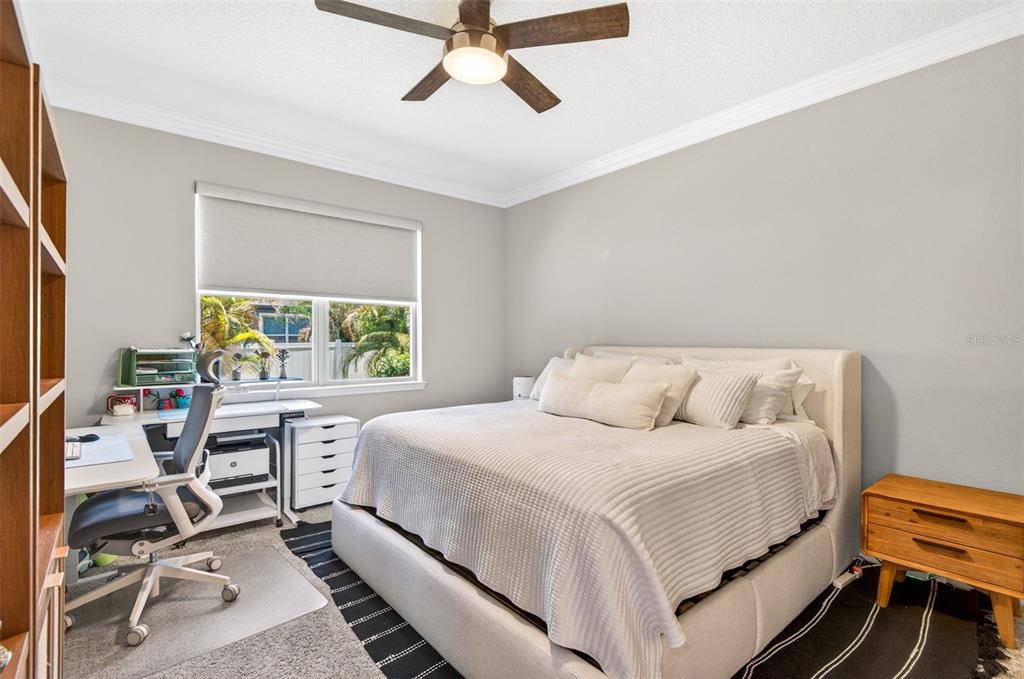 6427 Mooring Line Circle Apollo Beach, FL 33572 - Photo 26 of 34 a bedroom with a bed and a desk