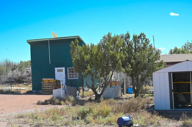 a backyard of a house with lots of green space
