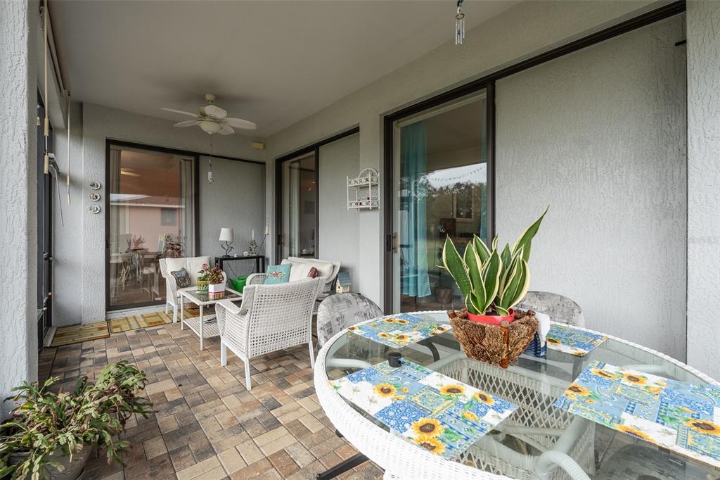15969 Southwest 14th Avenue Road Ocala, FL 34473 - Photo 16 of 46 a living room with furniture and a potted plant