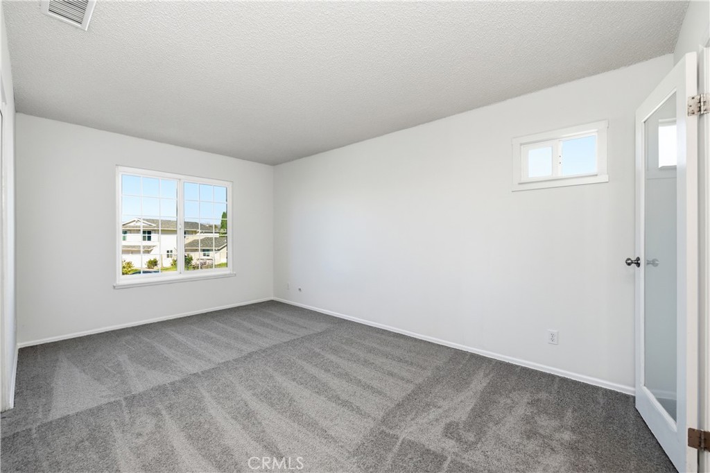 2490 Invar Court Simi Valley, CA 93065 - Photo 17 of 25 an empty room with windows