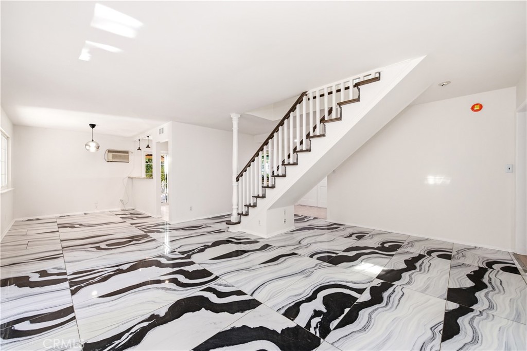 2490 Invar Court Simi Valley, CA 93065 - Photo 3 of 25 a view of a bedroom with wooden floor