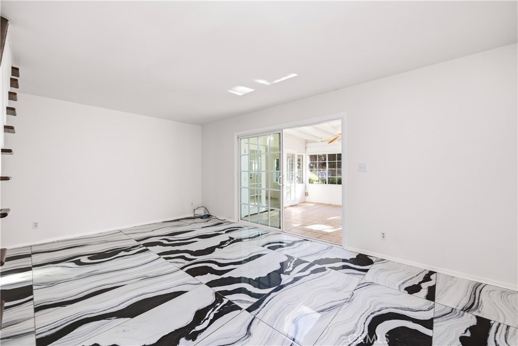 2490 Invar Court Simi Valley, CA 93065 - Photo 4 of 25 a bedroom with a bed and a window