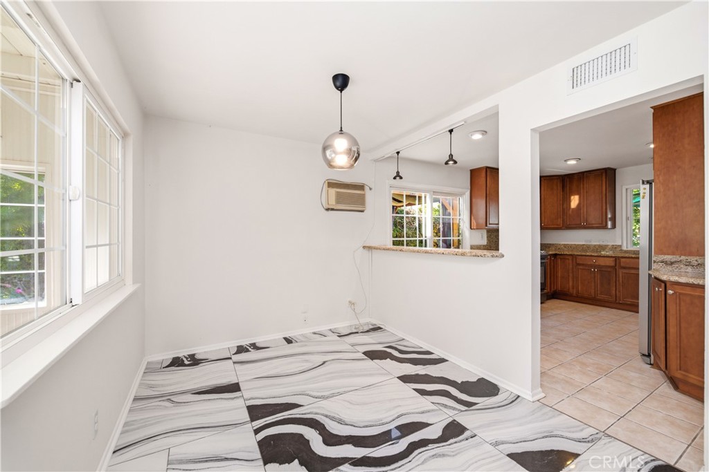 2490 Invar Court Simi Valley, CA 93065 - Photo 5 of 25 a kitchen with a sink appliances and cabinets