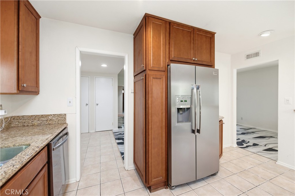 2490 Invar Court Simi Valley, CA 93065 - Photo 8 of 25 a view of a kitchen from the hallway