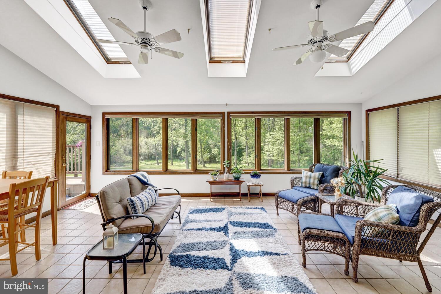 813 Marlboro Spring Road Kennett Square, PA 19348 - Photo 14 of 57 Sunroom leading to outside deck