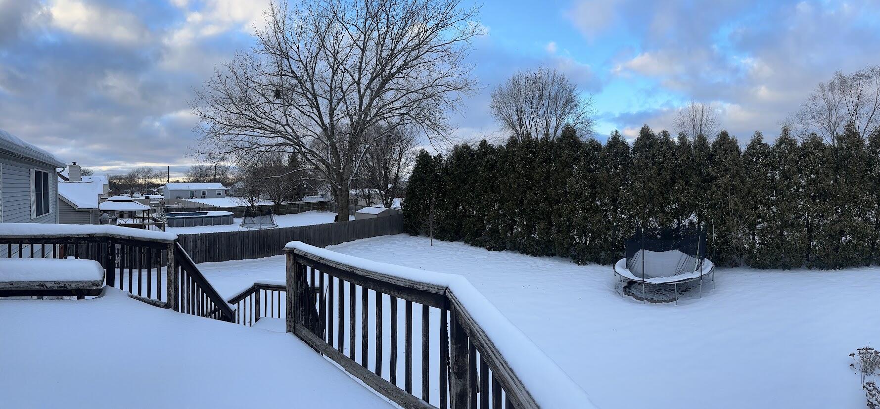 1518 West 96th Place Crown Point, IN 46307 - Photo 16 of 37 a view of a patio with two chairs and a table