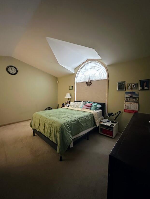 1518 West 96th Place Crown Point, IN 46307 - Photo 21 of 37 a bedroom with a bed and a chandelier